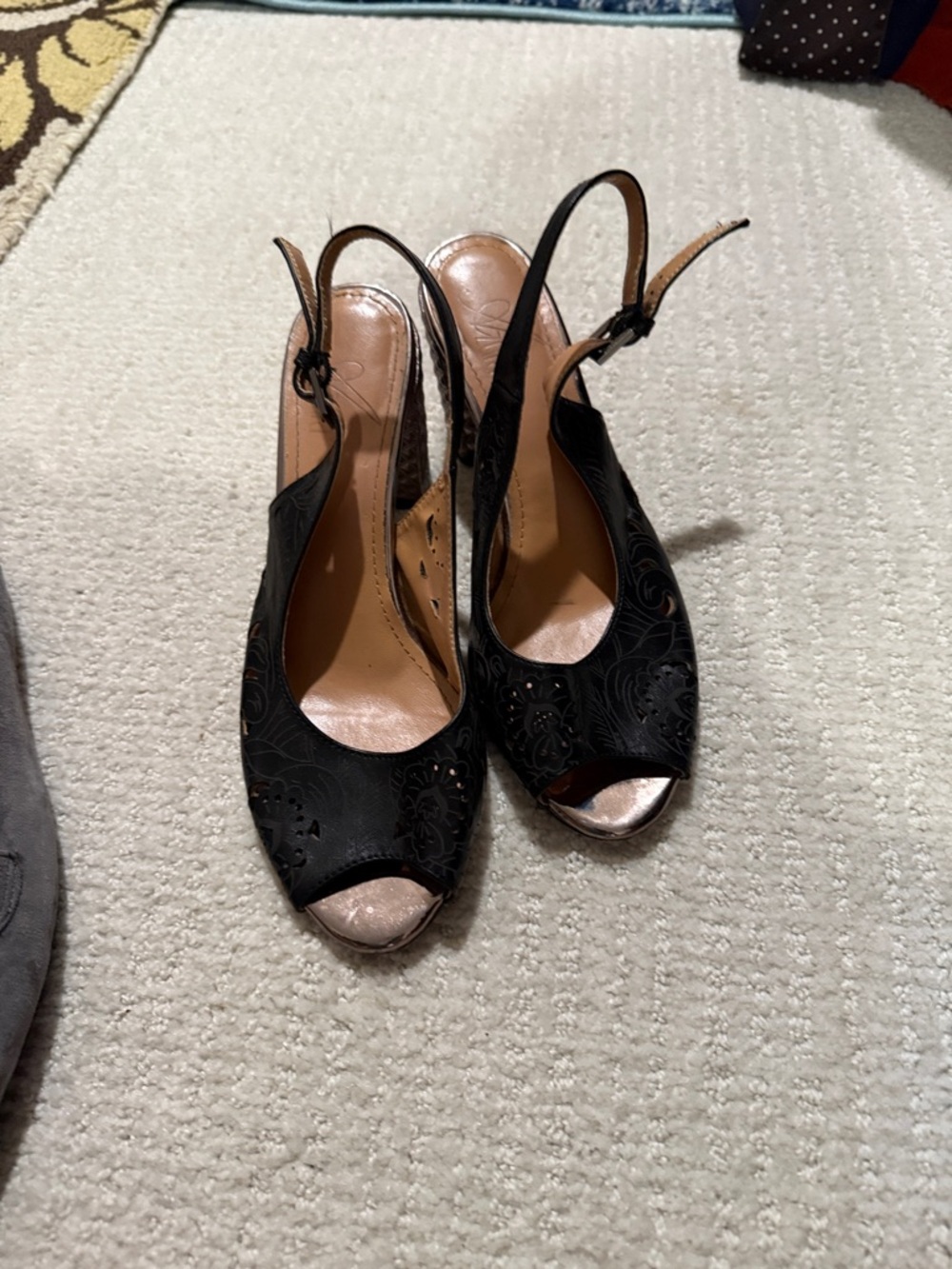 Black Peep-Toe Slingback Heels with Subtle Laser-Cut Detail